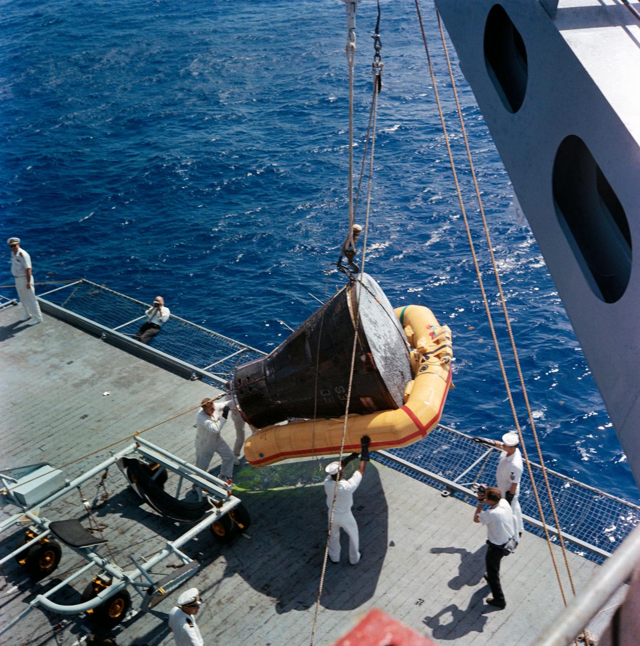 Gemini 4 capsule being hoisted aboard the USS Wasp after recovery